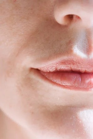 woman with pink lips