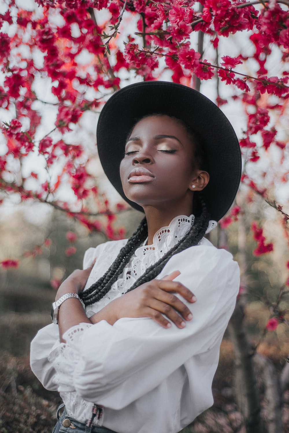 a woman in a white shirt with moisturized lips 