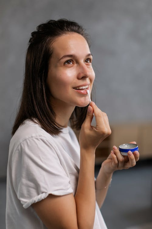 woman wearing lip balm