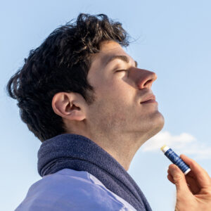 a man using an Alida Pure chapstick